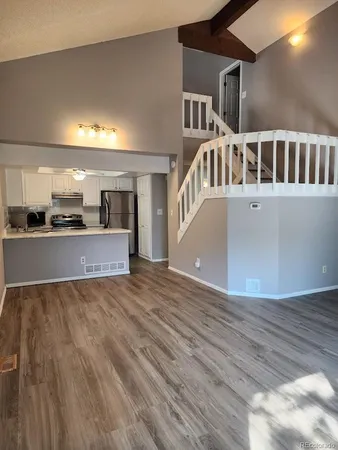 a view of a kitchen with a sink and dishwasher