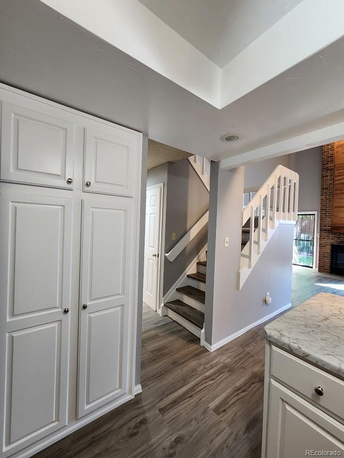 2685 South Dayton Way, Unit 365 Denver, CO 80231 - Photo 9 of 24 a view of an entryway with wooden floor