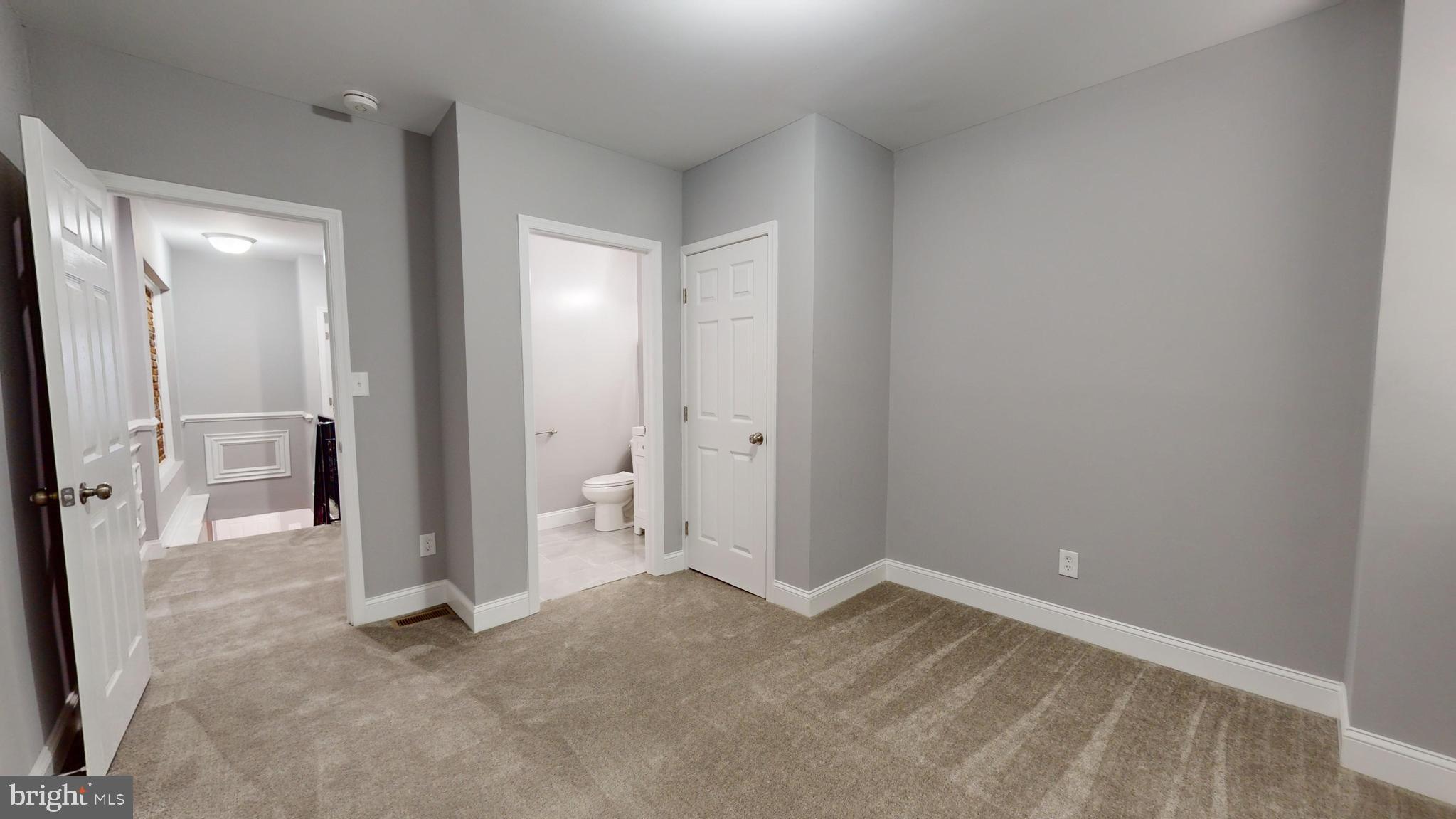 633 Archer Street Baltimore, MD 21230 - Photo 14 of 20 Spacious Bedroom 2 w/ Attached Bathroom