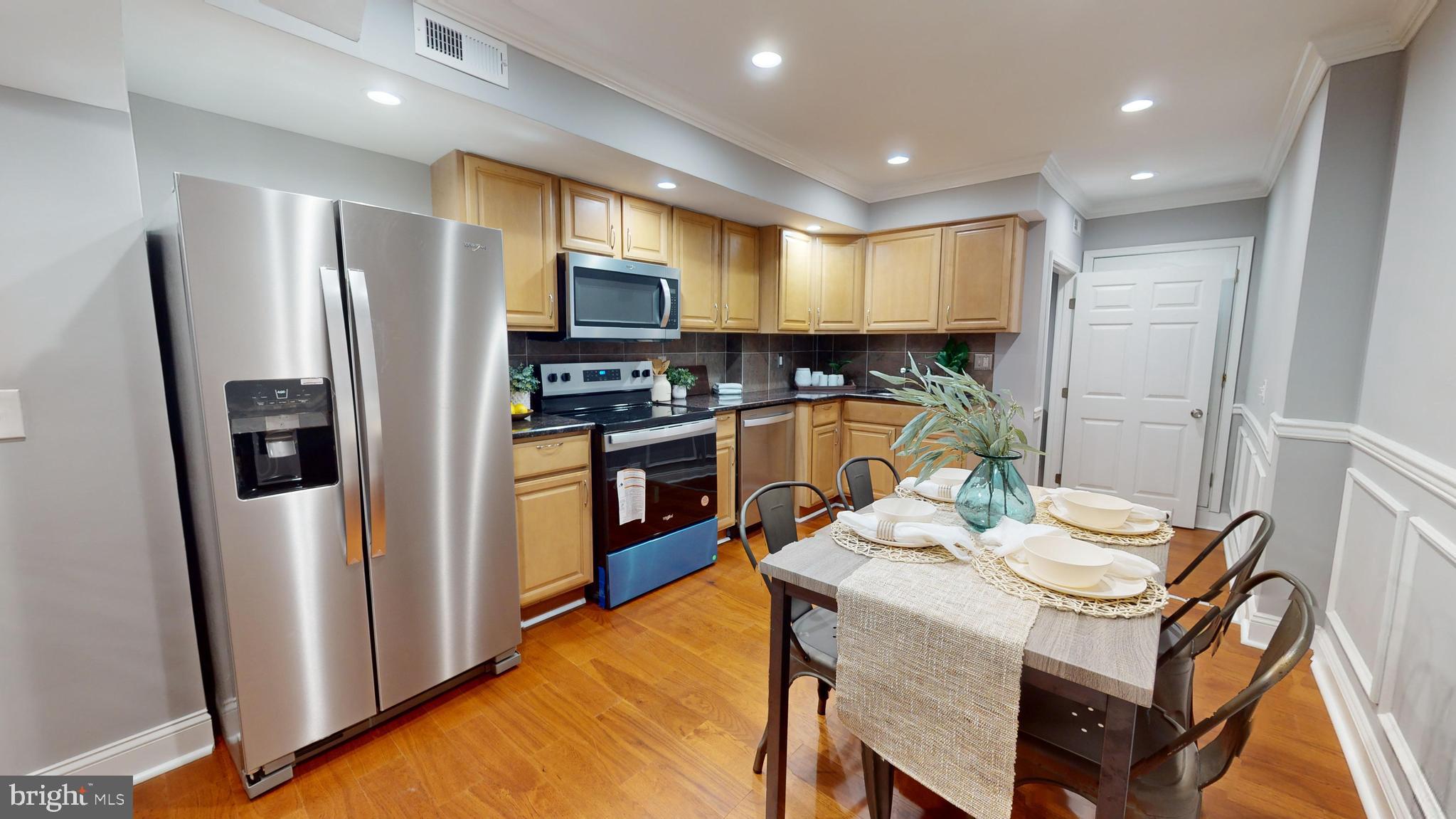 633 Archer Street Baltimore, MD 21230 - Photo 5 of 20 Kitchen w/ New Appliances and Granite Counters