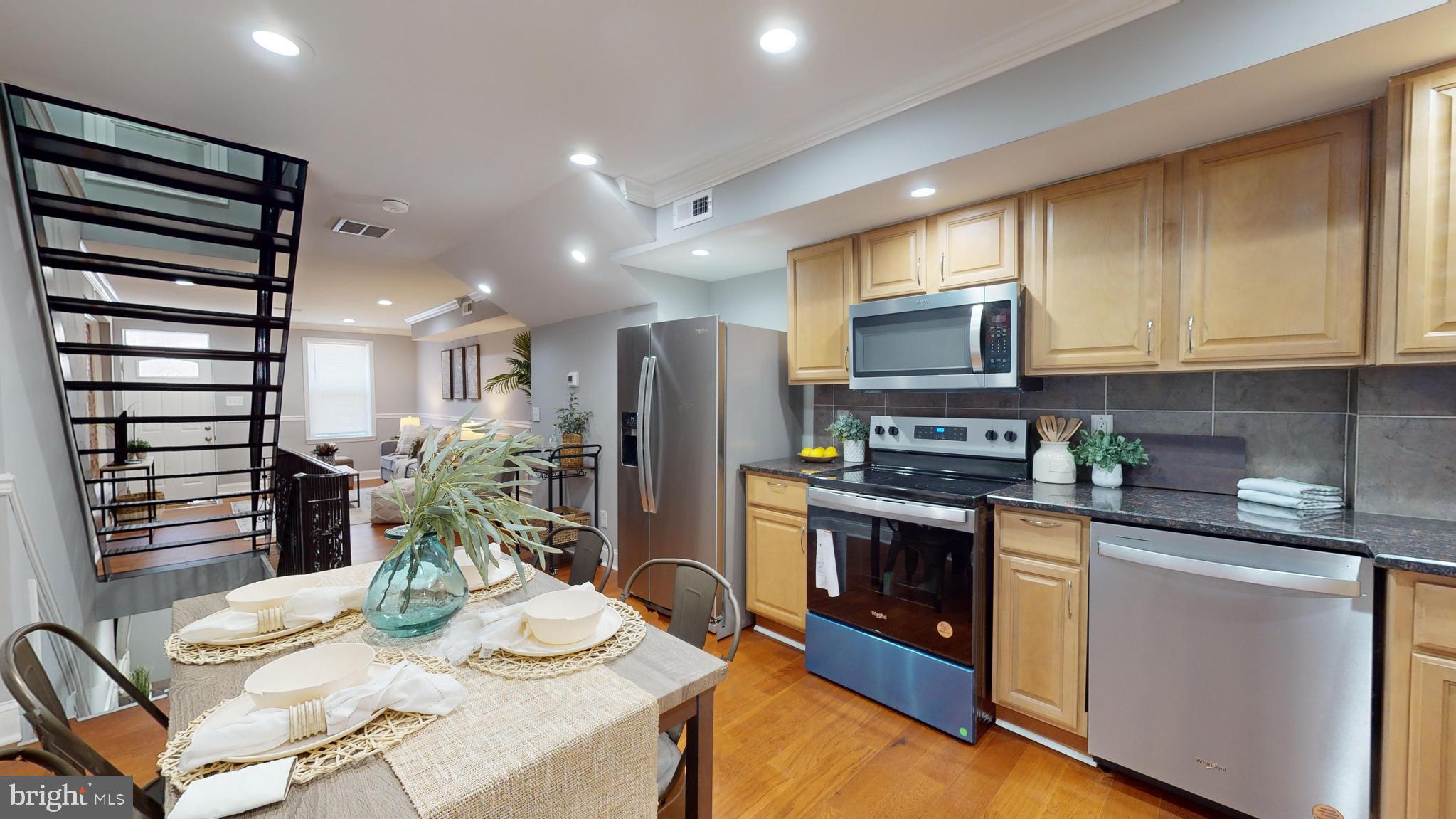 633 Archer Street Baltimore, MD 21230 - Photo 7 of 20 Kitchen w/ New Appliances and Granite Counters