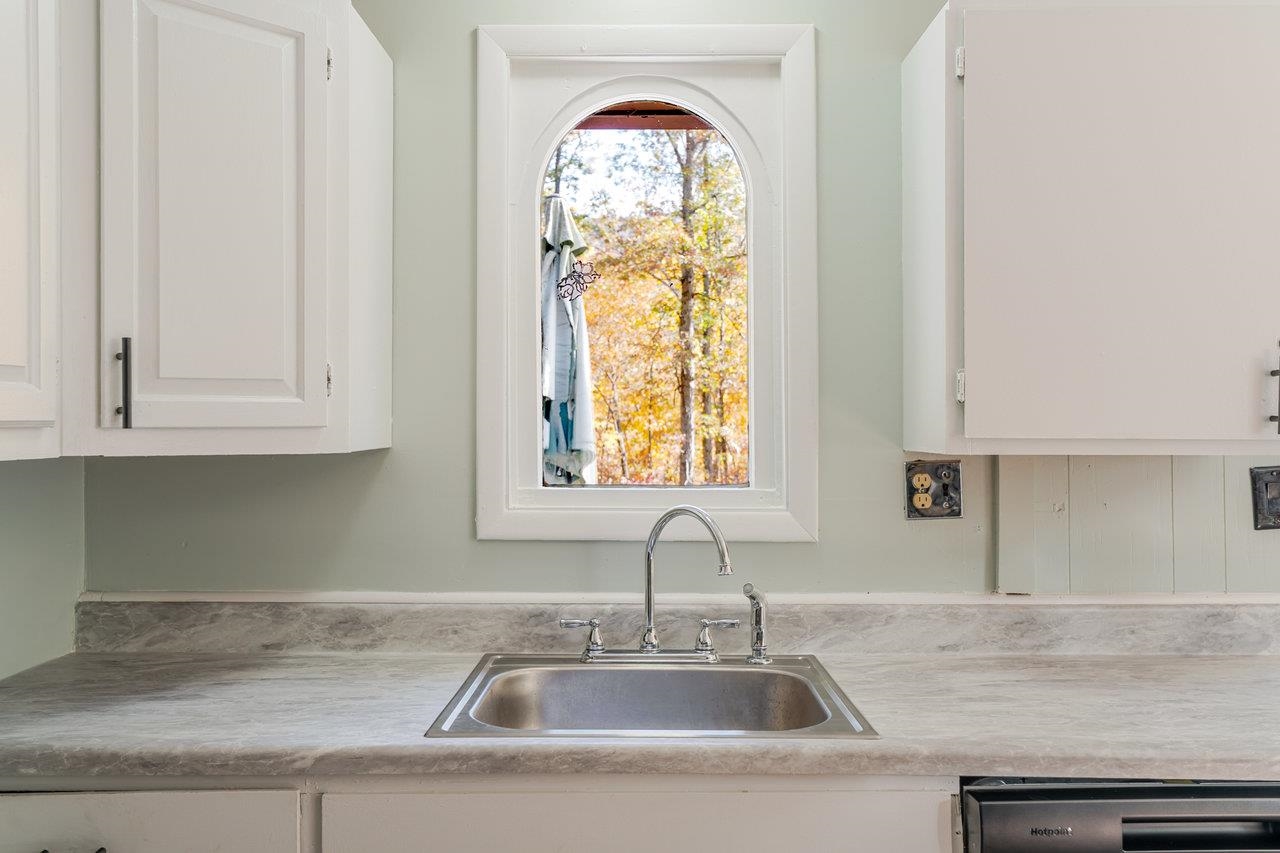 115 Risk Road Mount Jackson, VA 22842 - Photo 14 of 50 a bathroom with a sink and a window