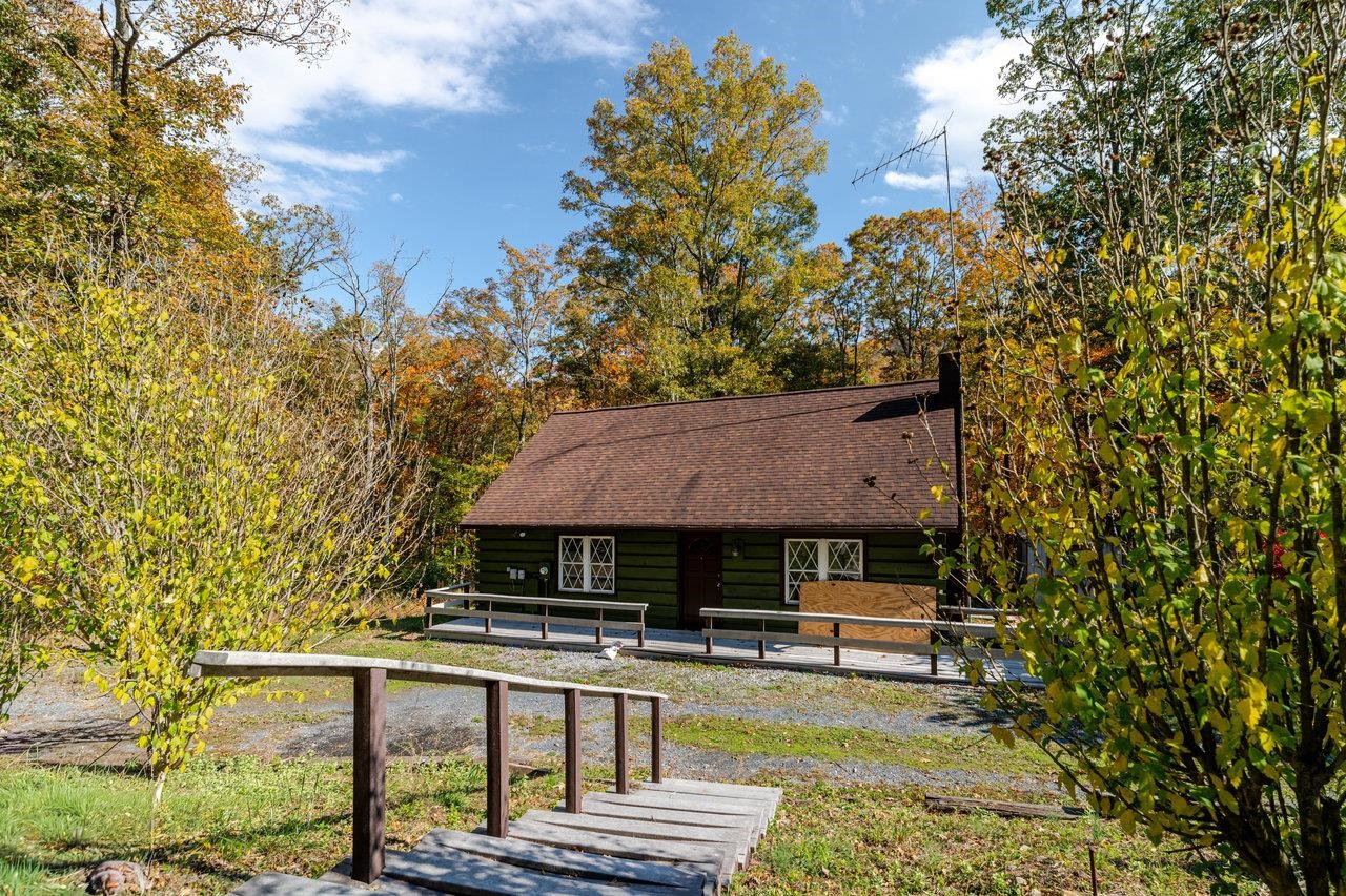 115 Risk Road Mount Jackson, VA 22842 - Photo 2 of 50 a house with trees in the background