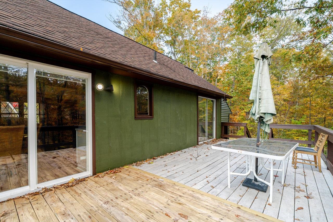 115 Risk Road Mount Jackson, VA 22842 - Photo 23 of 50 a backyard of a house with a table and chairs
