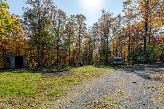 a fire hydrant in the middle of a field