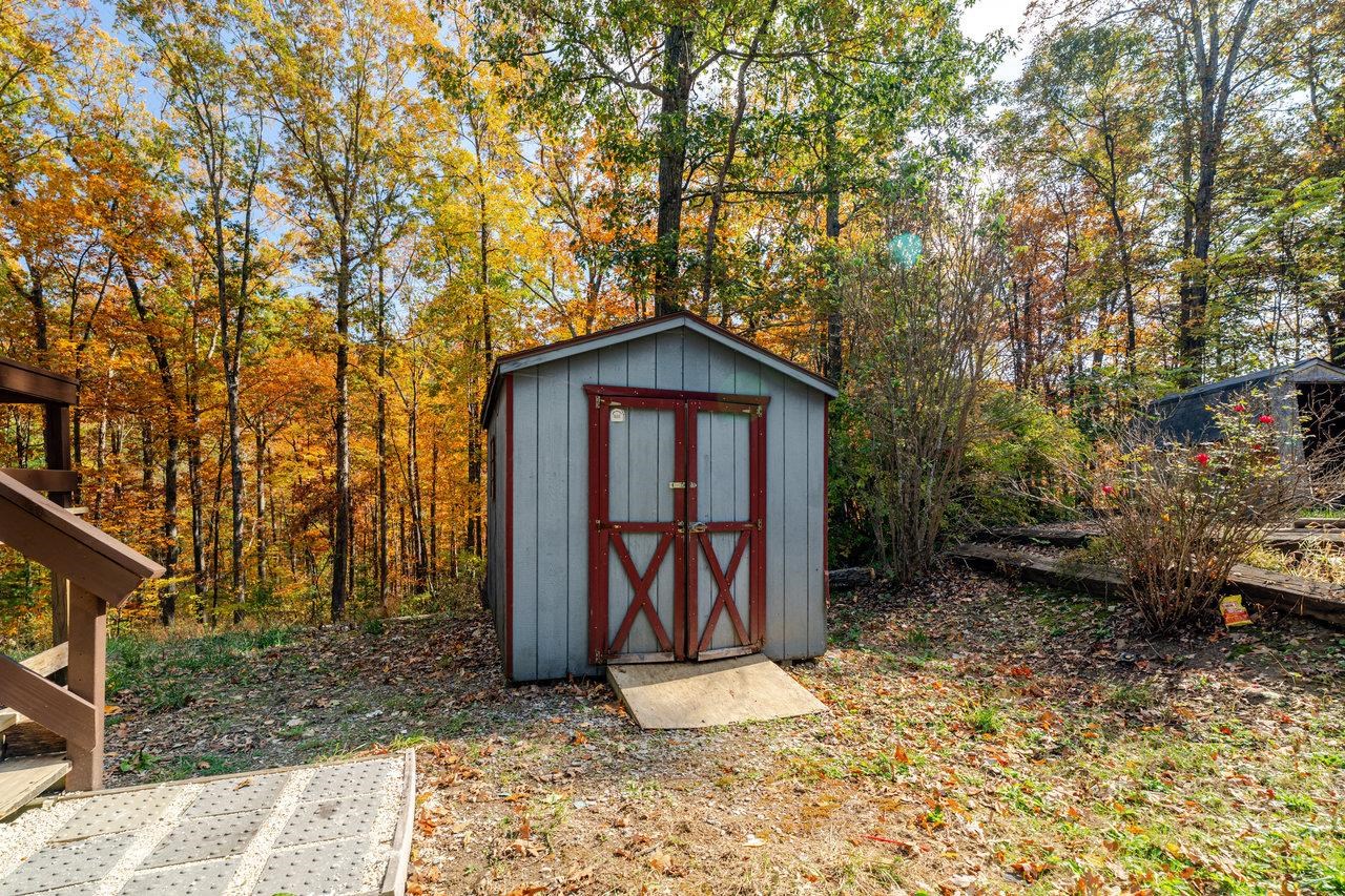 115 Risk Road Mount Jackson, VA 22842 - Photo 41 of 50 a view of barn with large windows and a small yard