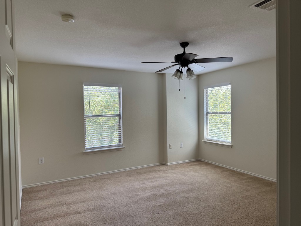 5609 Viewpoint Drive Austin, TX 78744 - Photo 12 of 21 a view of an empty room with a window