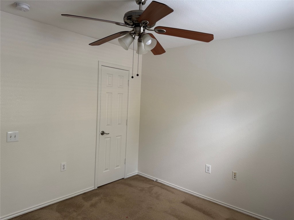 5609 Viewpoint Drive Austin, TX 78744 - Photo 16 of 21 a view of room with a ceiling fan