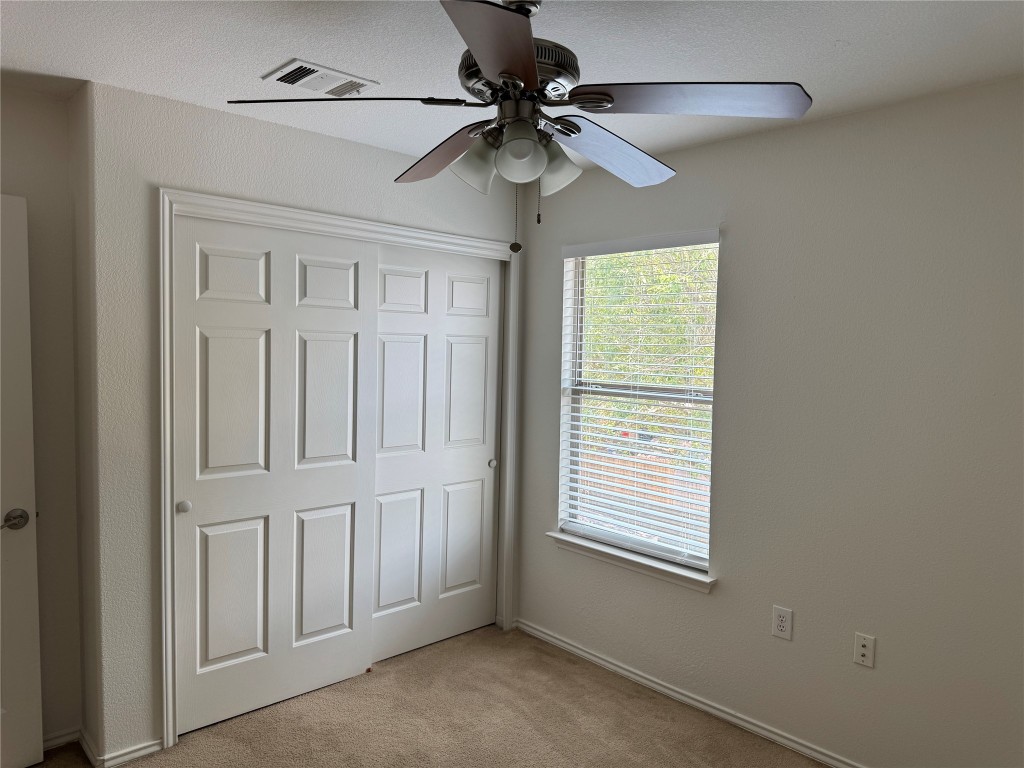 5609 Viewpoint Drive Austin, TX 78744 - Photo 18 of 21 a view of an empty room with a window