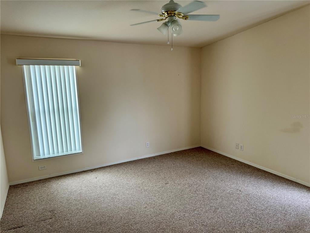 1644 Ibis Court Punta Gorda, FL 33982 - Photo 16 of 42 an empty room with a window