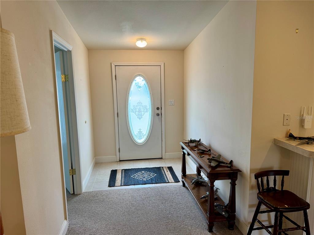 1644 Ibis Court Punta Gorda, FL 33982 - Photo 4 of 42 a living room with furniture and a wooden floor