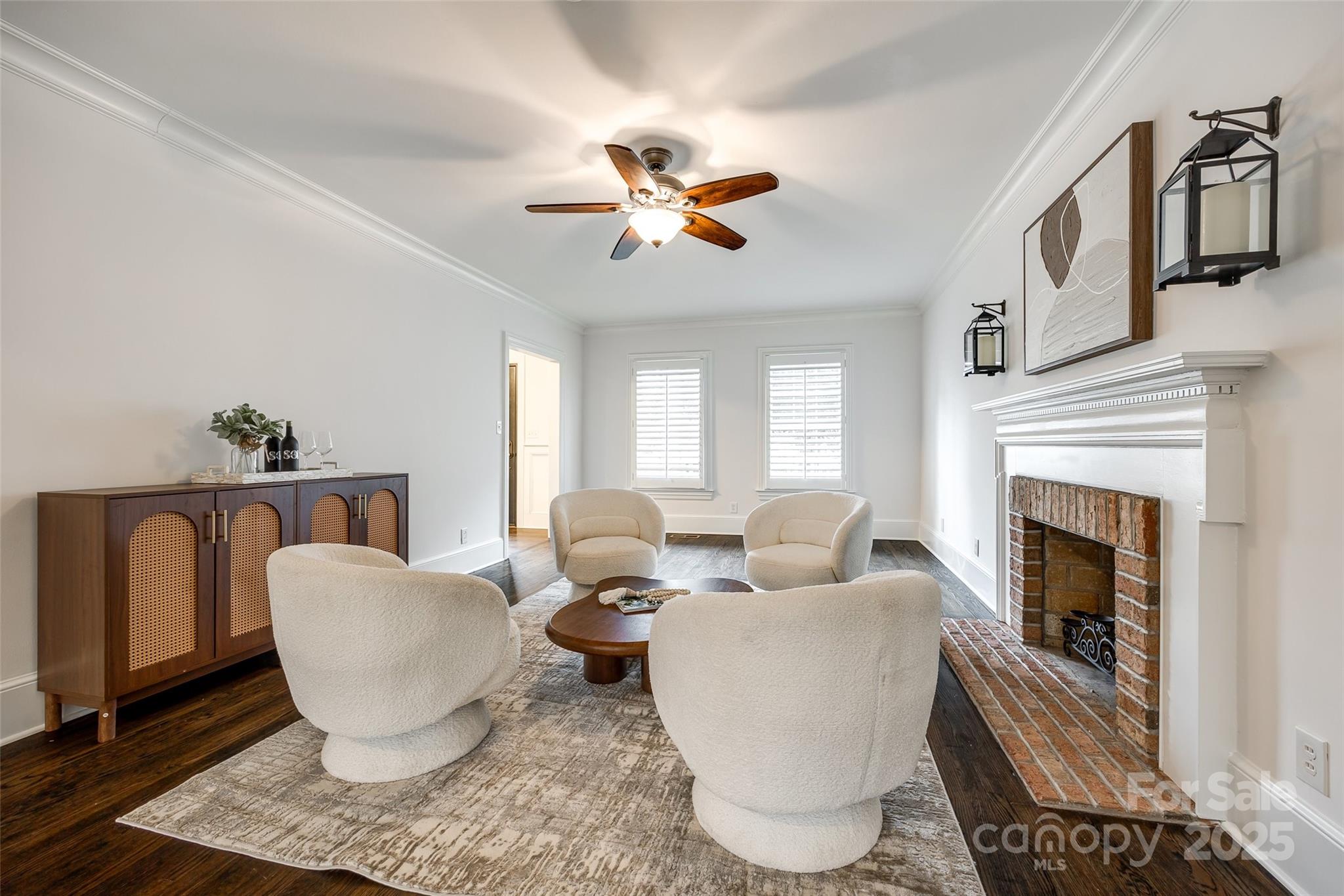 1225 Providence Road Charlotte, NC 28207 - Photo 17 of 42 a living room with furniture and a fireplace