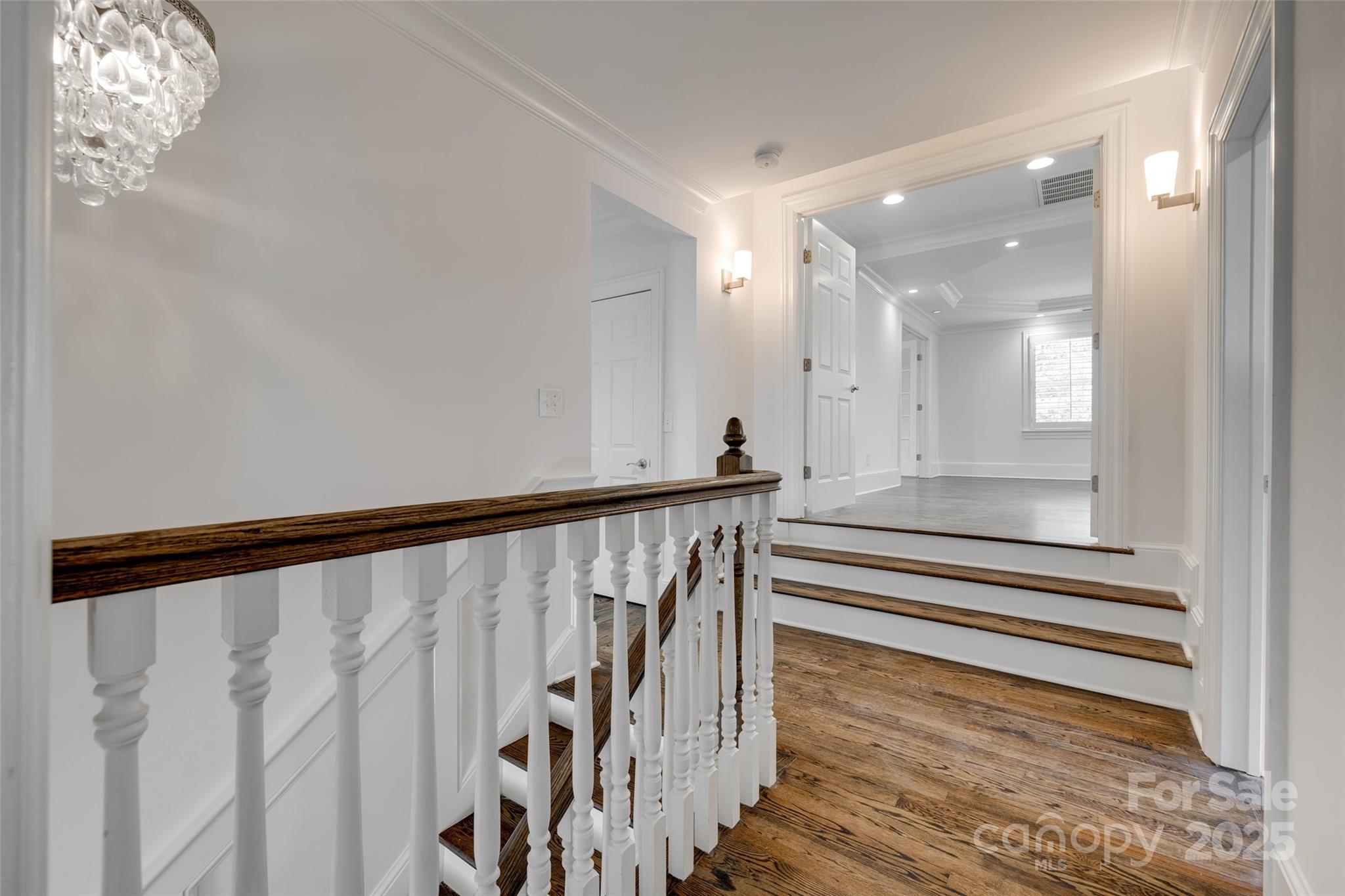 1225 Providence Road Charlotte, NC 28207 - Photo 23 of 42 a view of entryway with wooden floor