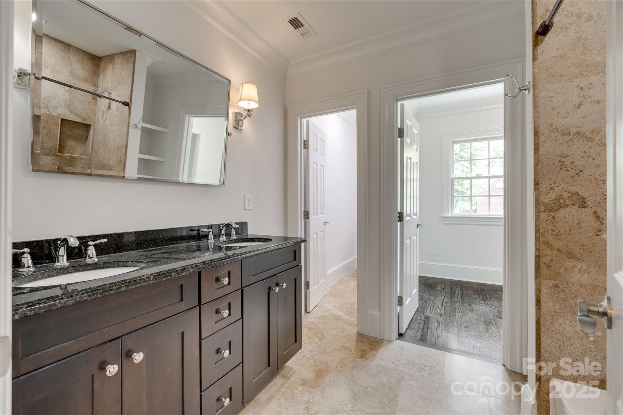 1225 Providence Road Charlotte, NC 28207 - Photo 32 of 42 a kitchen with stainless steel appliances granite countertop a sink and a stove