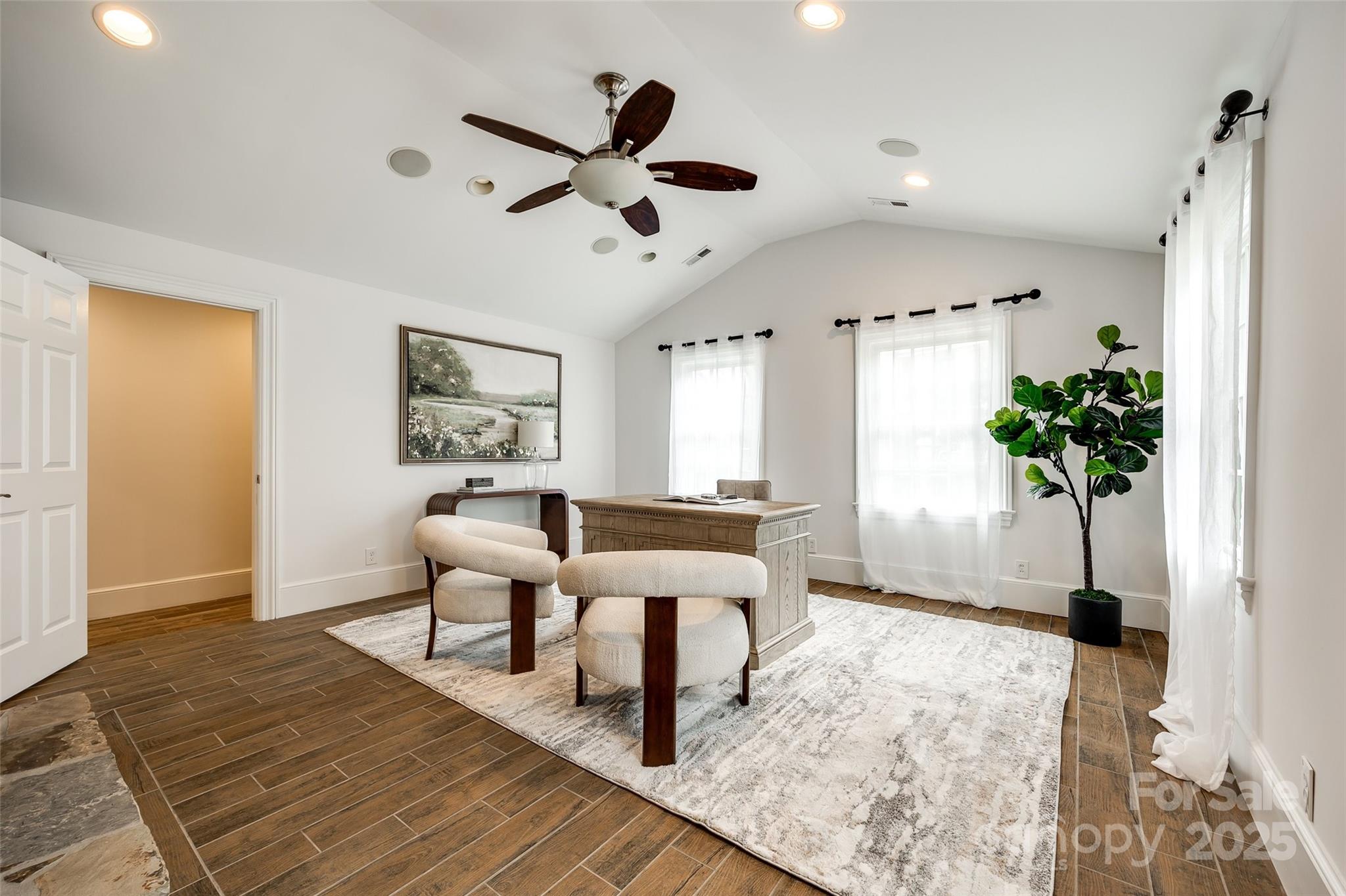 1225 Providence Road Charlotte, NC 28207 - Photo 9 of 42 a living room with furniture and a potted plant