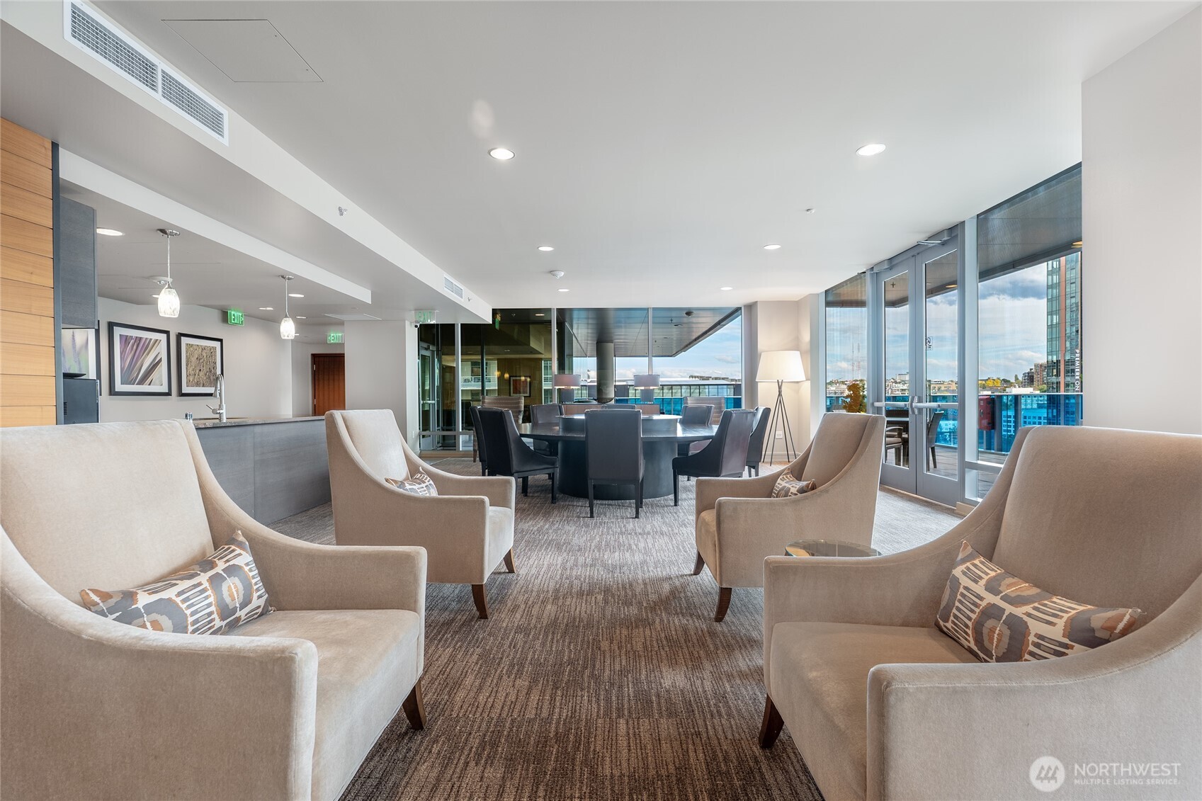 737 Olive Way, Unit 2908 Seattle, WA 98101 - Photo 23 of 35 a living room with furniture and a table