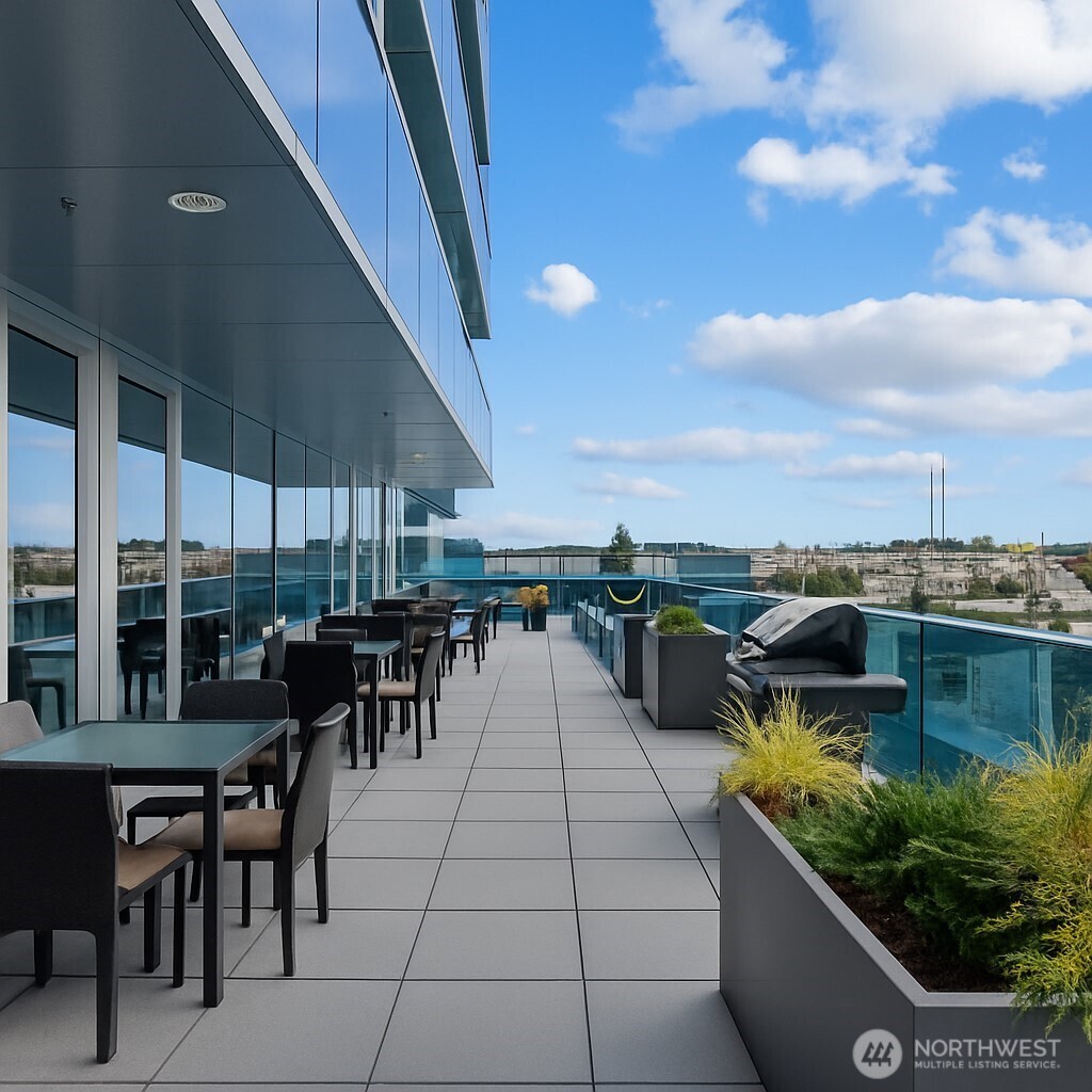 737 Olive Way, Unit 2908 Seattle, WA 98101 - Photo 29 of 35 an outdoor space with lots of chairs and kitchen view