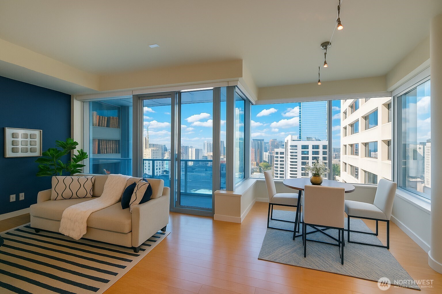 737 Olive Way, Unit 2908 Seattle, WA 98101 - Photo 10 of 35 a living room with furniture and a large window