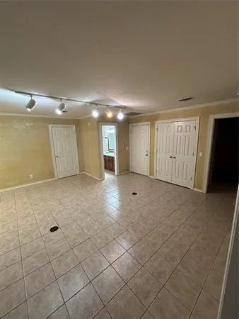 a bathroom with a sink and mirror with toilet