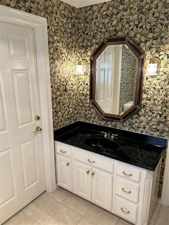 a bathroom with a sink and a toilet