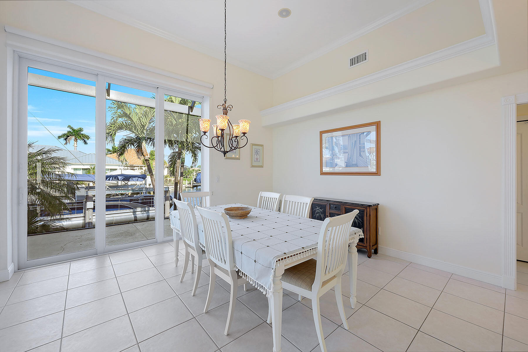 409 Waterleaf Court Marco Island, FL 34145 - Photo 12 of 38 a view of a dining room with furniture