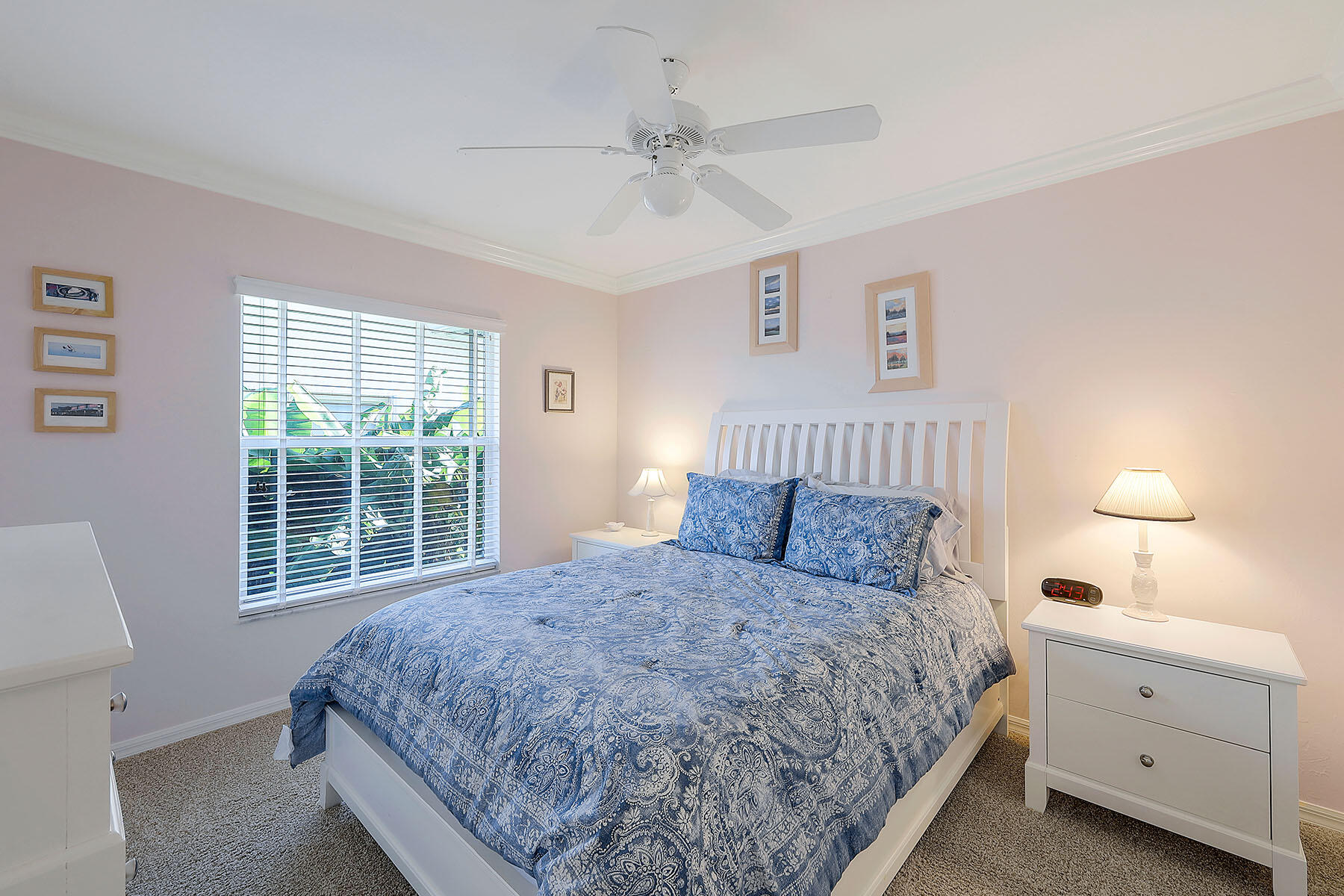409 Waterleaf Court Marco Island, FL 34145 - Photo 20 of 38 a bedroom with a bed and a window