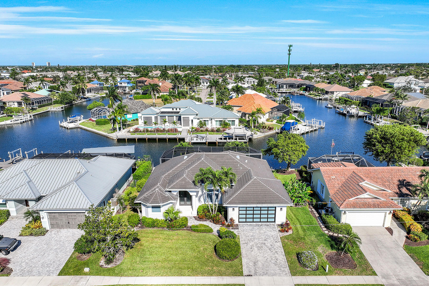 409 Waterleaf Court Marco Island, FL 34145 - Photo 2 of 38 an aerial view of residential houses with outdoor space