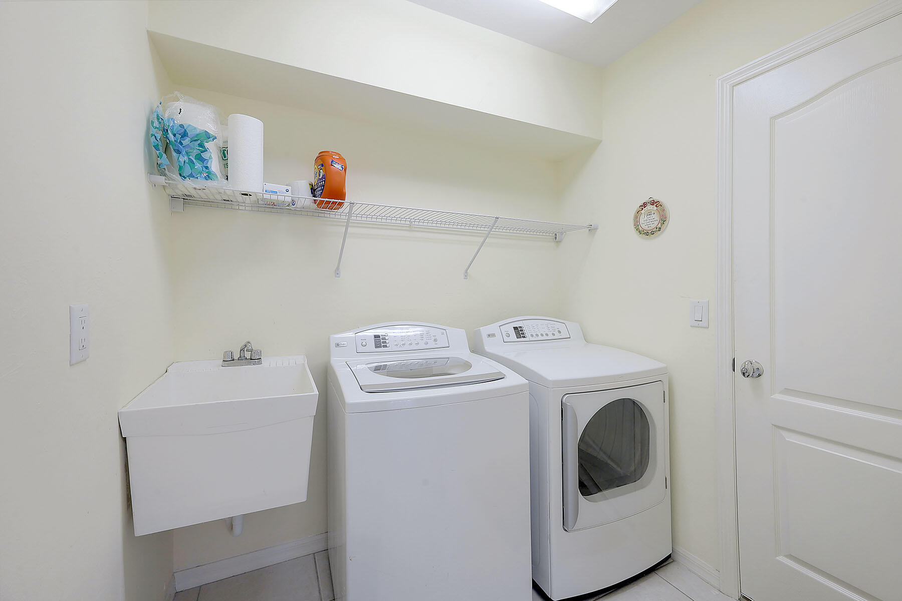 409 Waterleaf Court Marco Island, FL 34145 - Photo 21 of 38 a utility room with dryer and washer