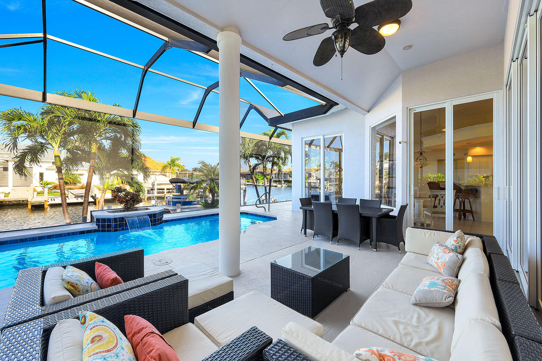 409 Waterleaf Court Marco Island, FL 34145 - Photo 23 of 38 a living room with lots of furniture and a large window