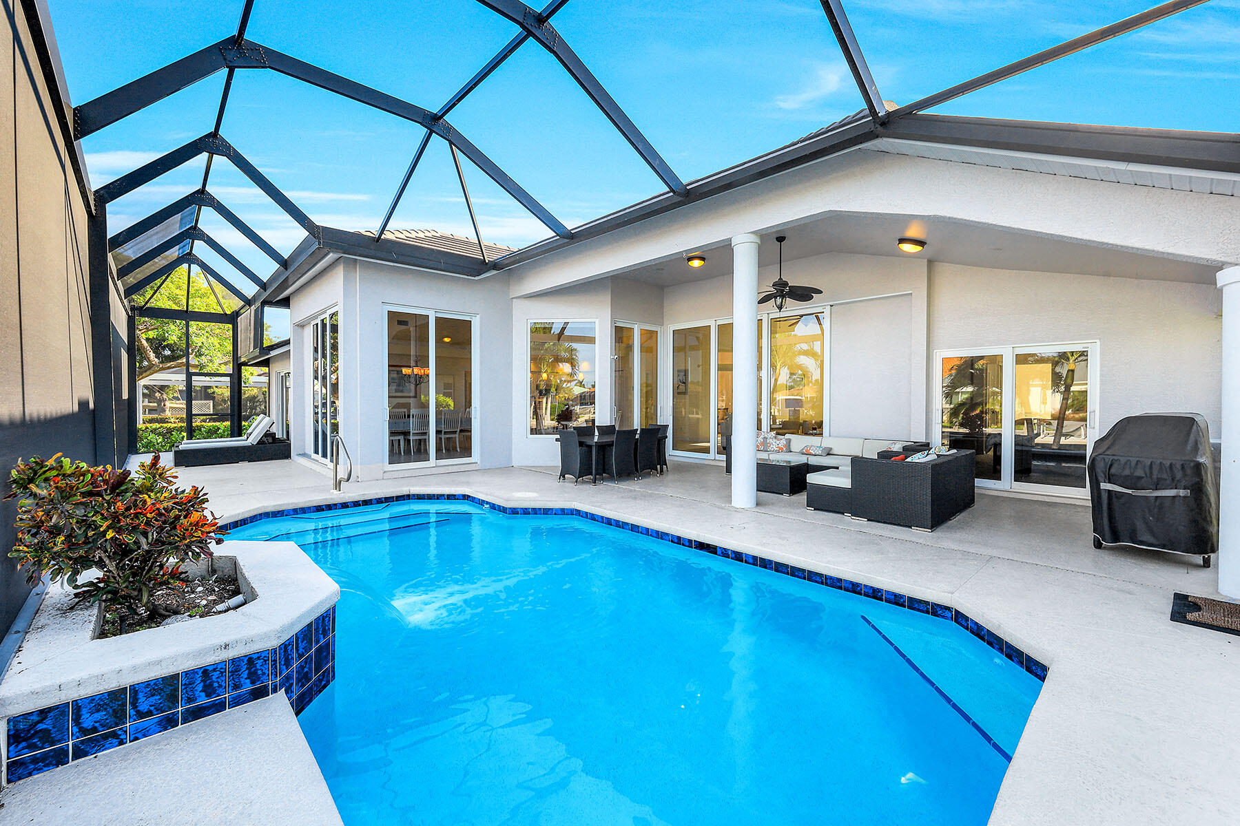 409 Waterleaf Court Marco Island, FL 34145 - Photo 25 of 38 a lobby with furniture and a table