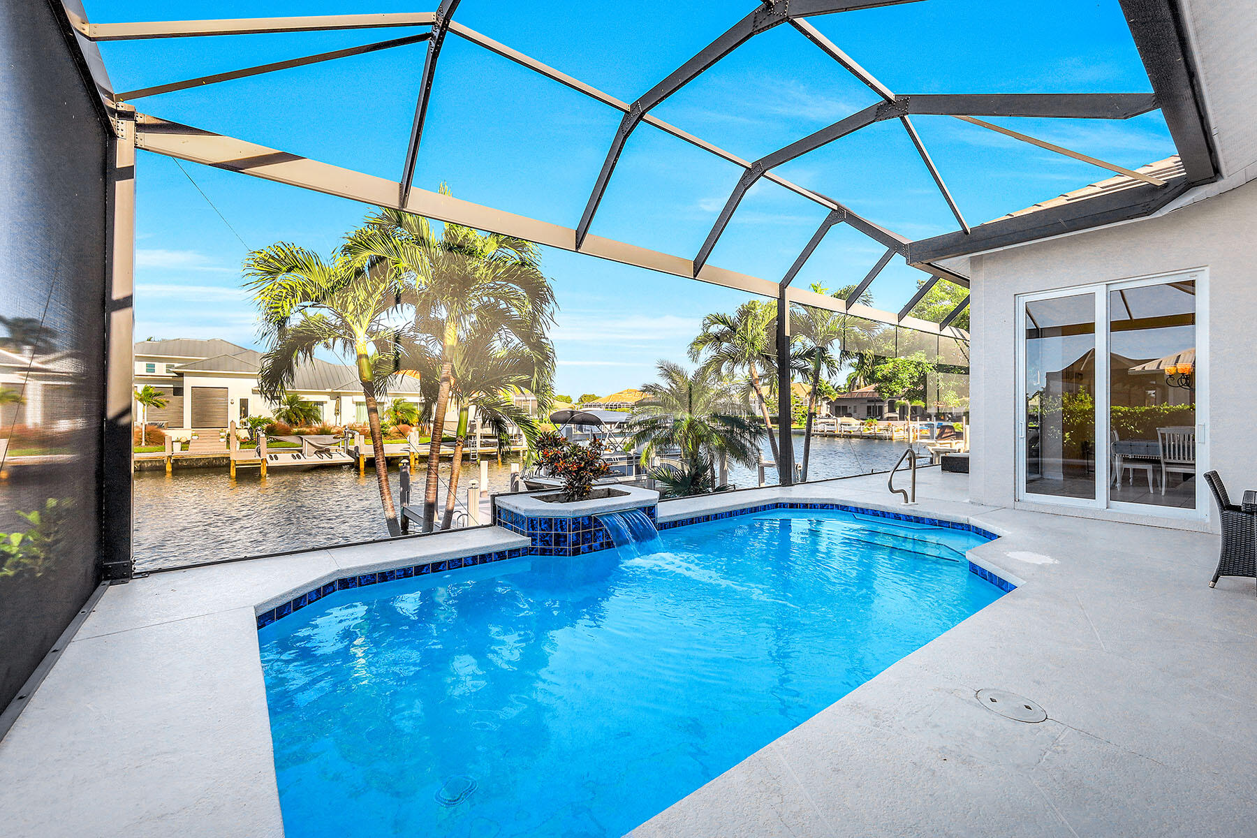 409 Waterleaf Court Marco Island, FL 34145 - Photo 26 of 38 a view of swimming pool with outdoor seating