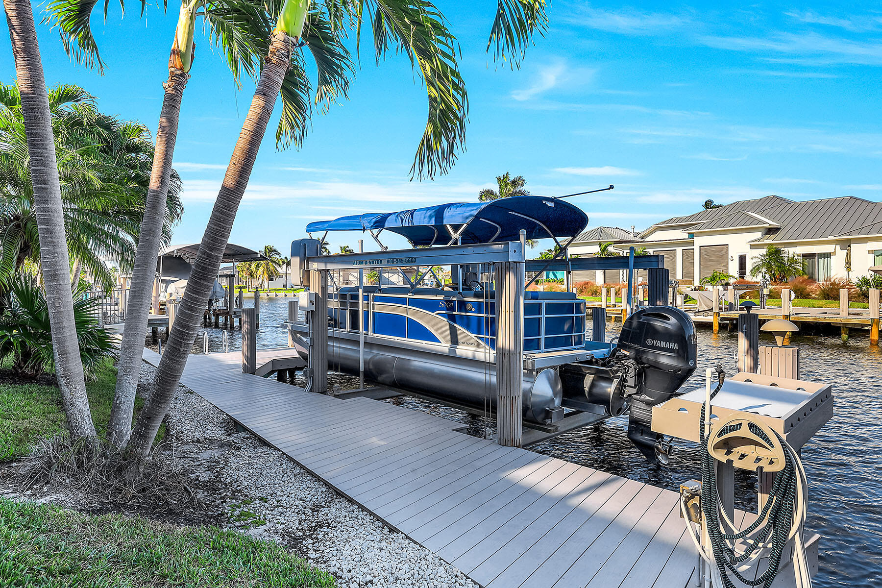 409 Waterleaf Court Marco Island, FL 34145 - Photo 30 of 38 a view of a chairs and table in the patio