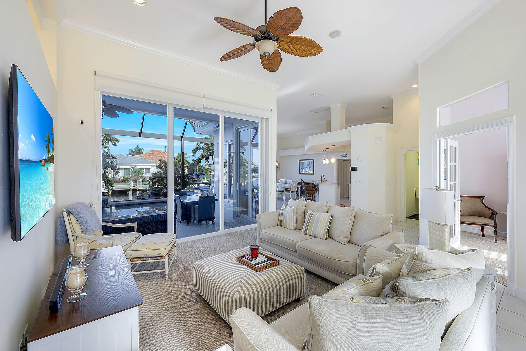 409 Waterleaf Court Marco Island, FL 34145 - Photo 5 of 38 a living room with furniture and a large window