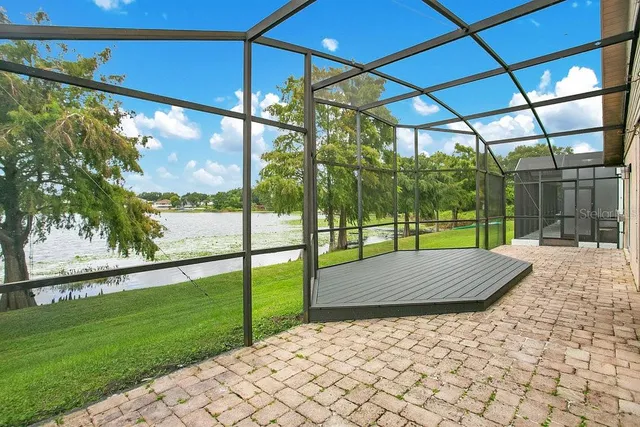 a view of a porch with a backyard