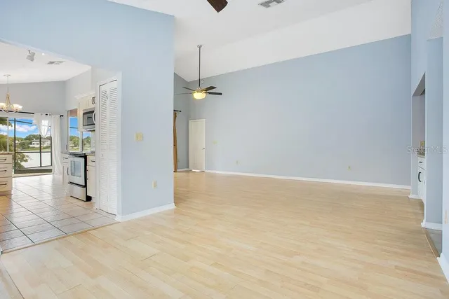 a view of an empty room and window