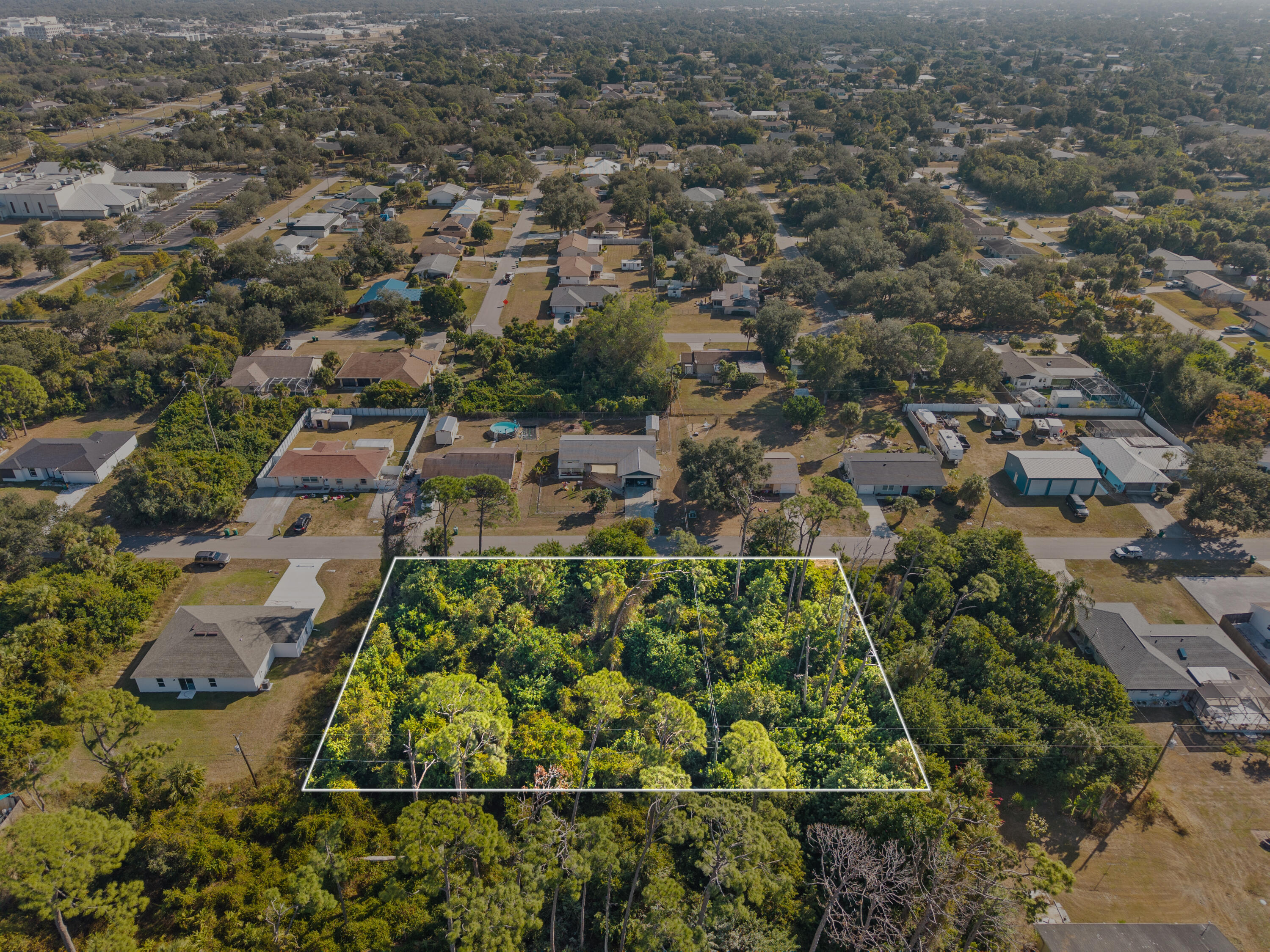 2091 Midnight Street Port Charlotte, FL 33948 - Photo 9 of 12 DJI_20251119100707_0467_D_2