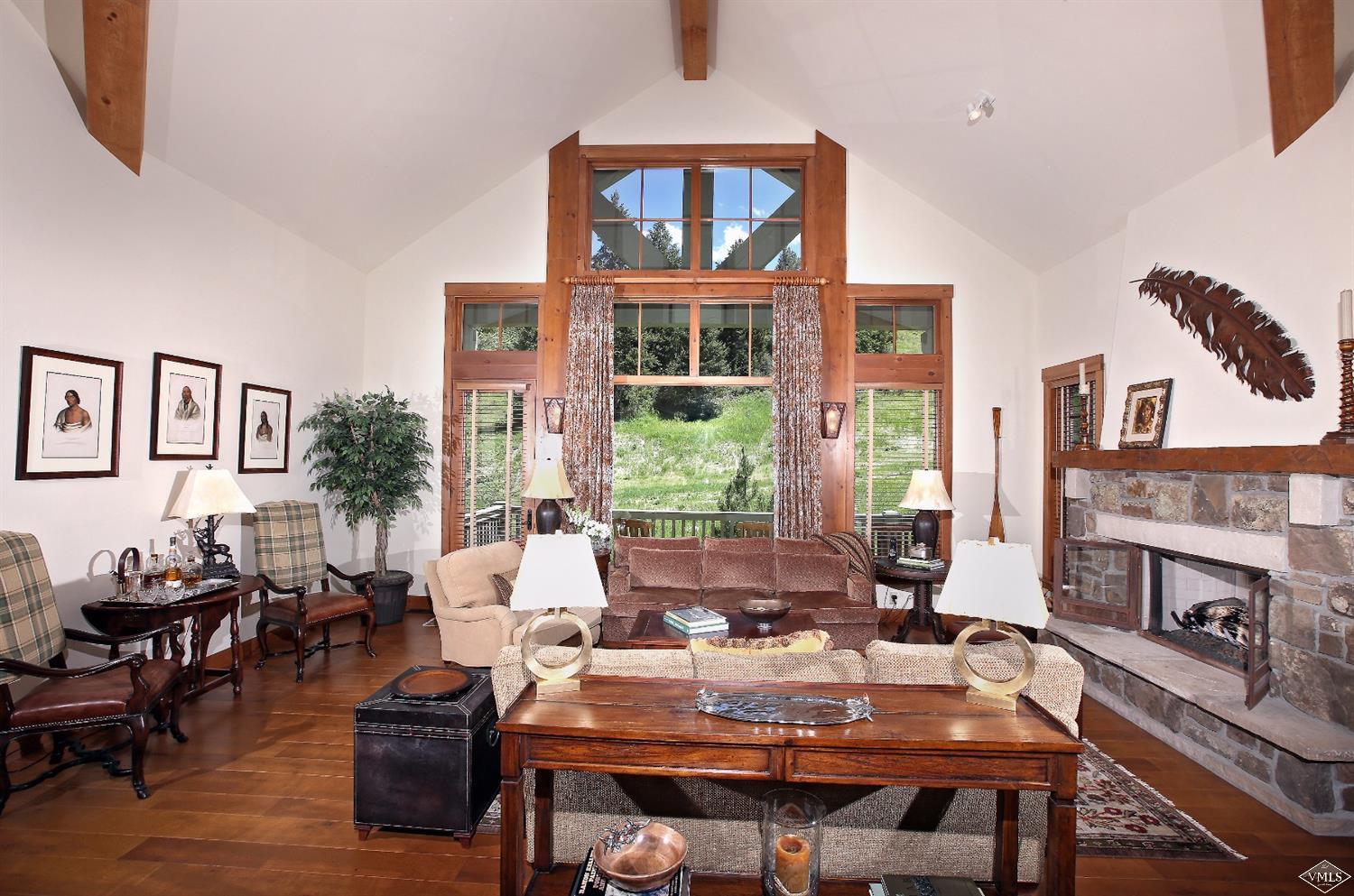 404 Cresta Road Edwards, CO 81632 - Photo 16 of 24 a view of a dining room with furniture window and wooden floor