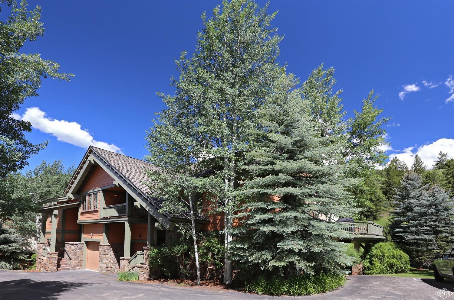 404 Cresta Road Edwards, CO 81632 - Photo 22 of 24 a view of a house with a tree in the background