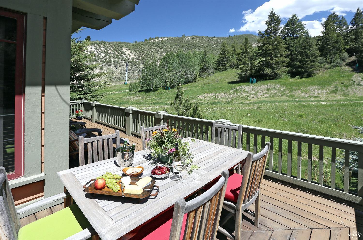404 Cresta Road Edwards, CO 81632 - Photo 23 of 24 a view of deck with furniture and a garden