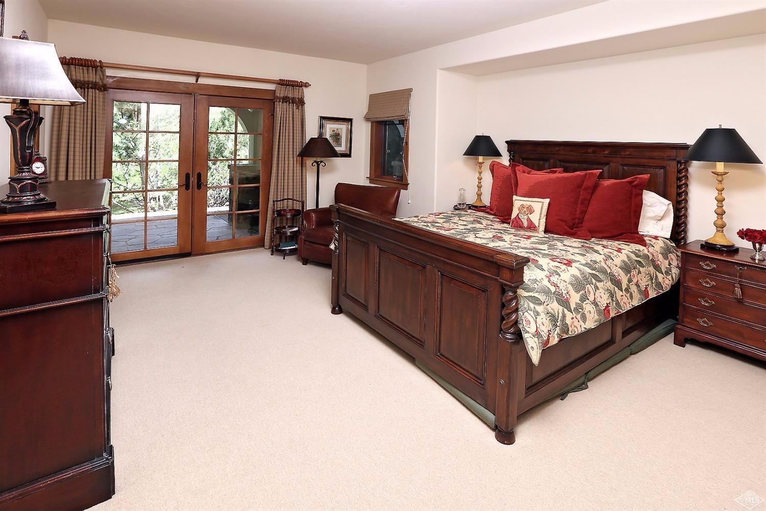 404 Cresta Road Edwards, CO 81632 - Photo 10 of 24 a bed sitting in a bedroom next to a window