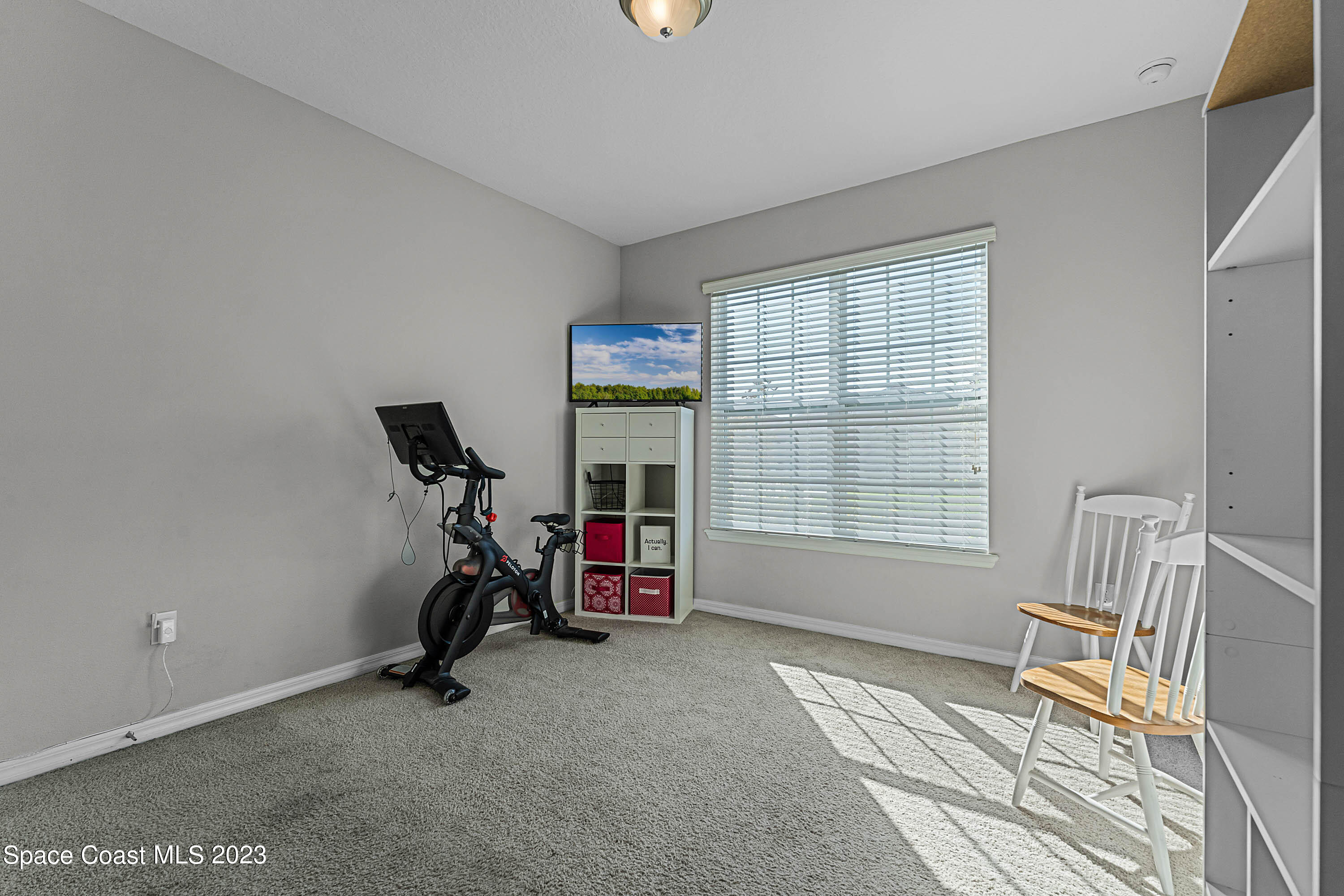 1803 Brockridge Road Kissimmee, FL 34744 - Photo 25 of 46 a view of a room with gym equipment