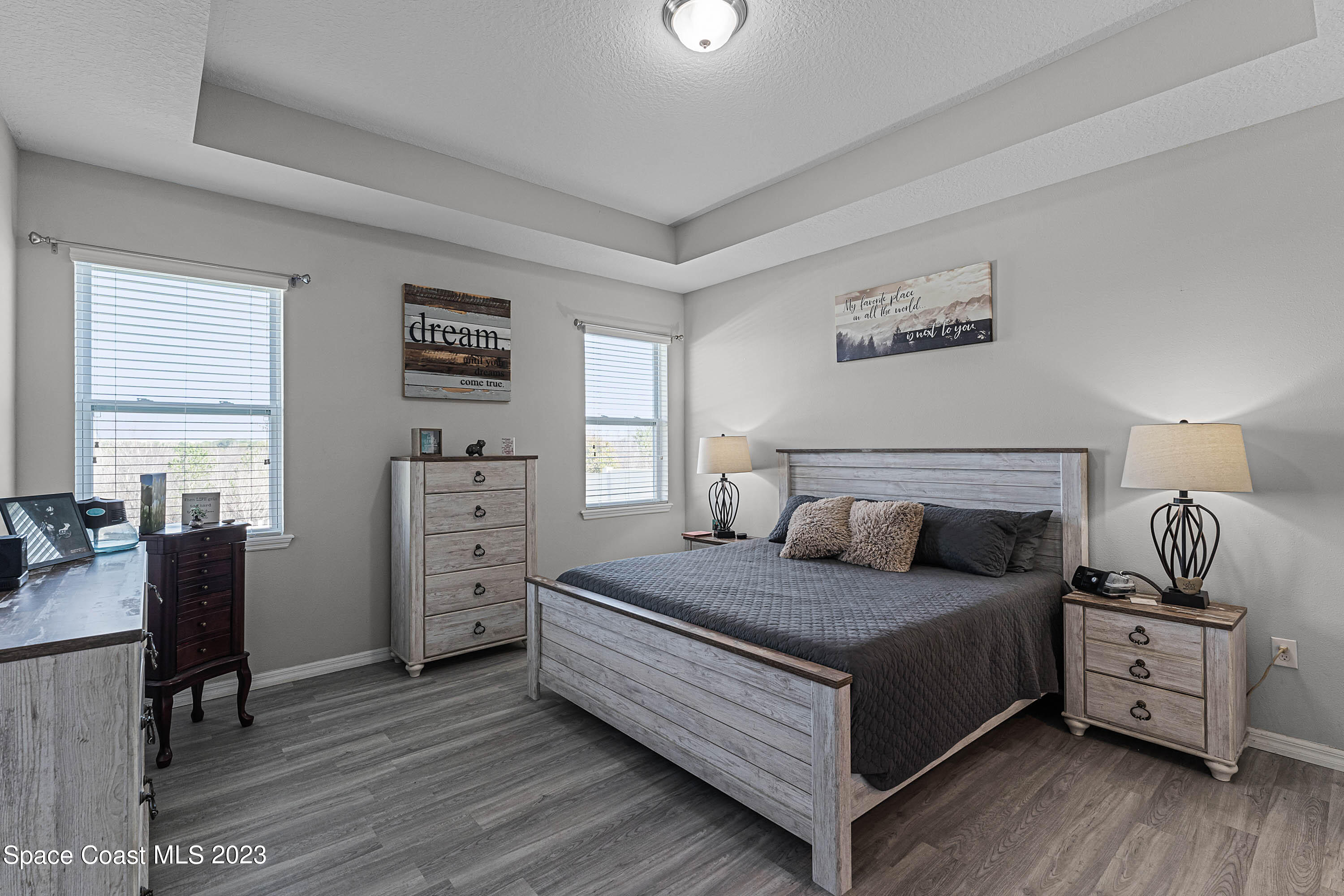 1803 Brockridge Road Kissimmee, FL 34744 - Photo 30 of 46 a bedroom with a bed and a couch