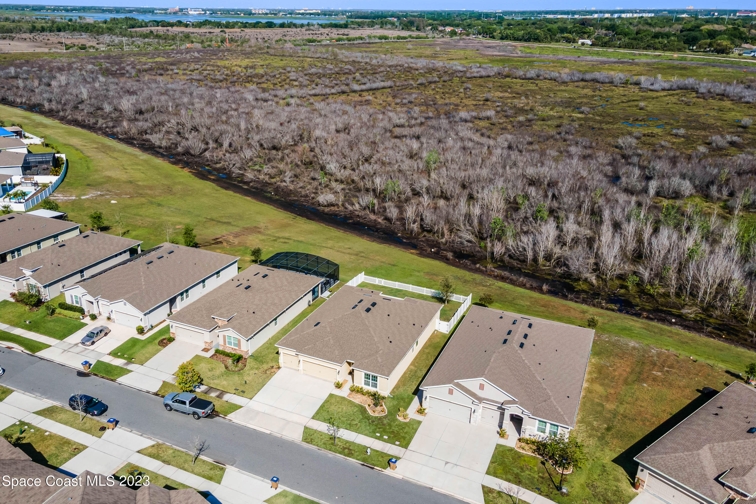 1803 Brockridge Road Kissimmee, FL 34744 - Photo 3 of 46 an aerial view of a house with a lake view