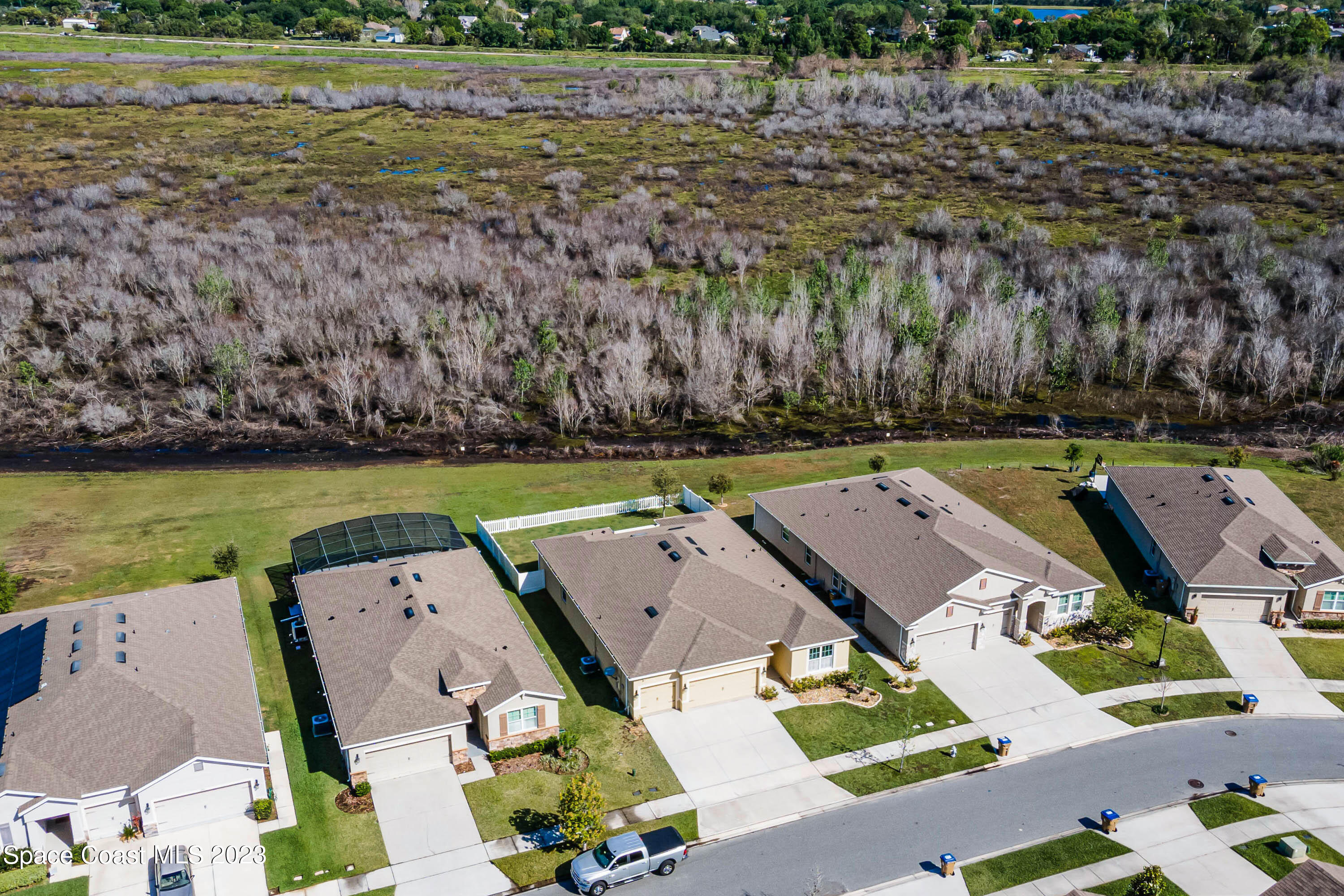 1803 Brockridge Road Kissimmee, FL 34744 - Photo 36 of 46 an aerial view of a house with a lake view