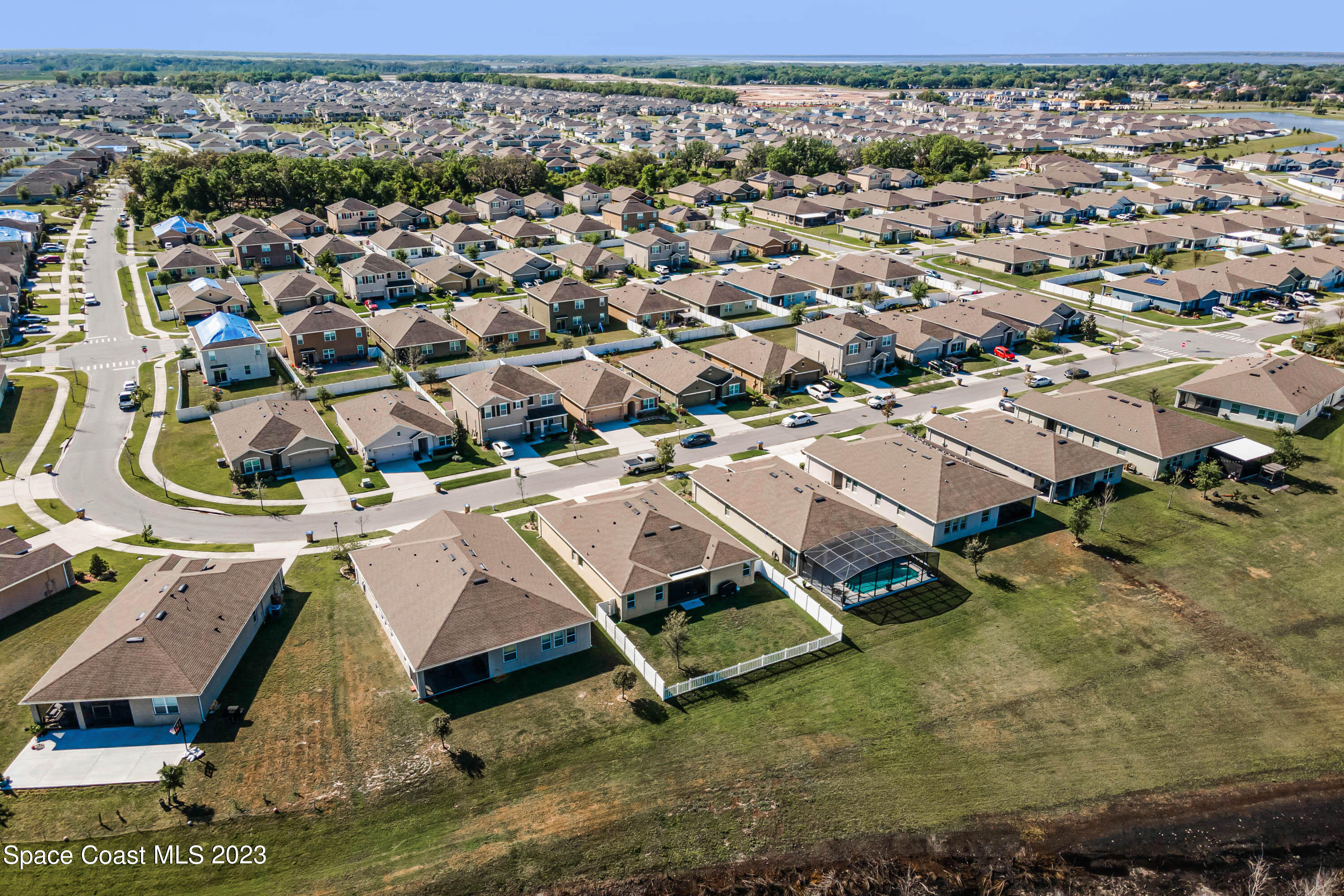 1803 Brockridge Road Kissimmee, FL 34744 - Photo 39 of 46 an aerial view of residential houses with outdoor space