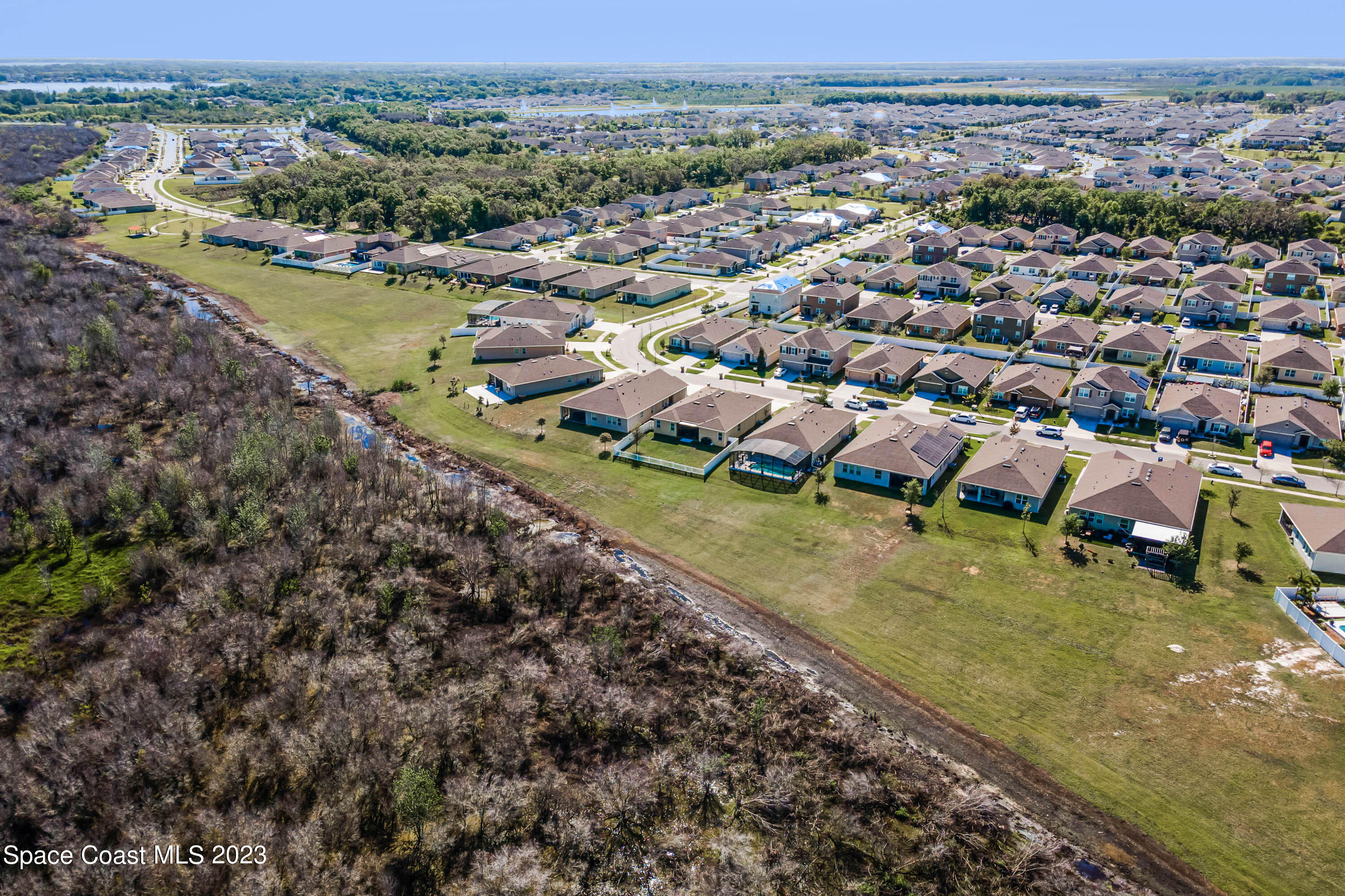 1803 Brockridge Road Kissimmee, FL 34744 - Photo 40 of 46 an aerial view of residential houses with outdoor space