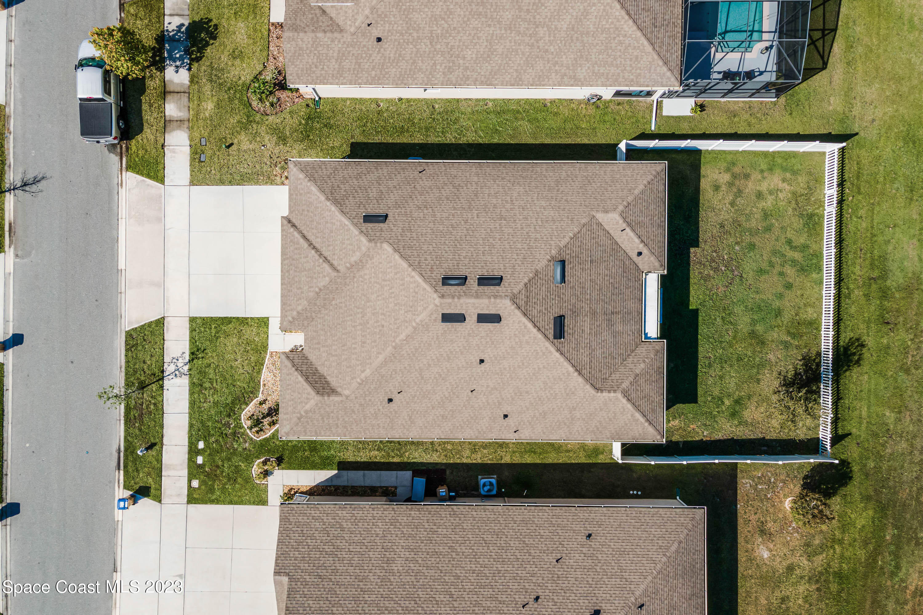 1803 Brockridge Road Kissimmee, FL 34744 - Photo 4 of 46 an aerial view of a house with a yard