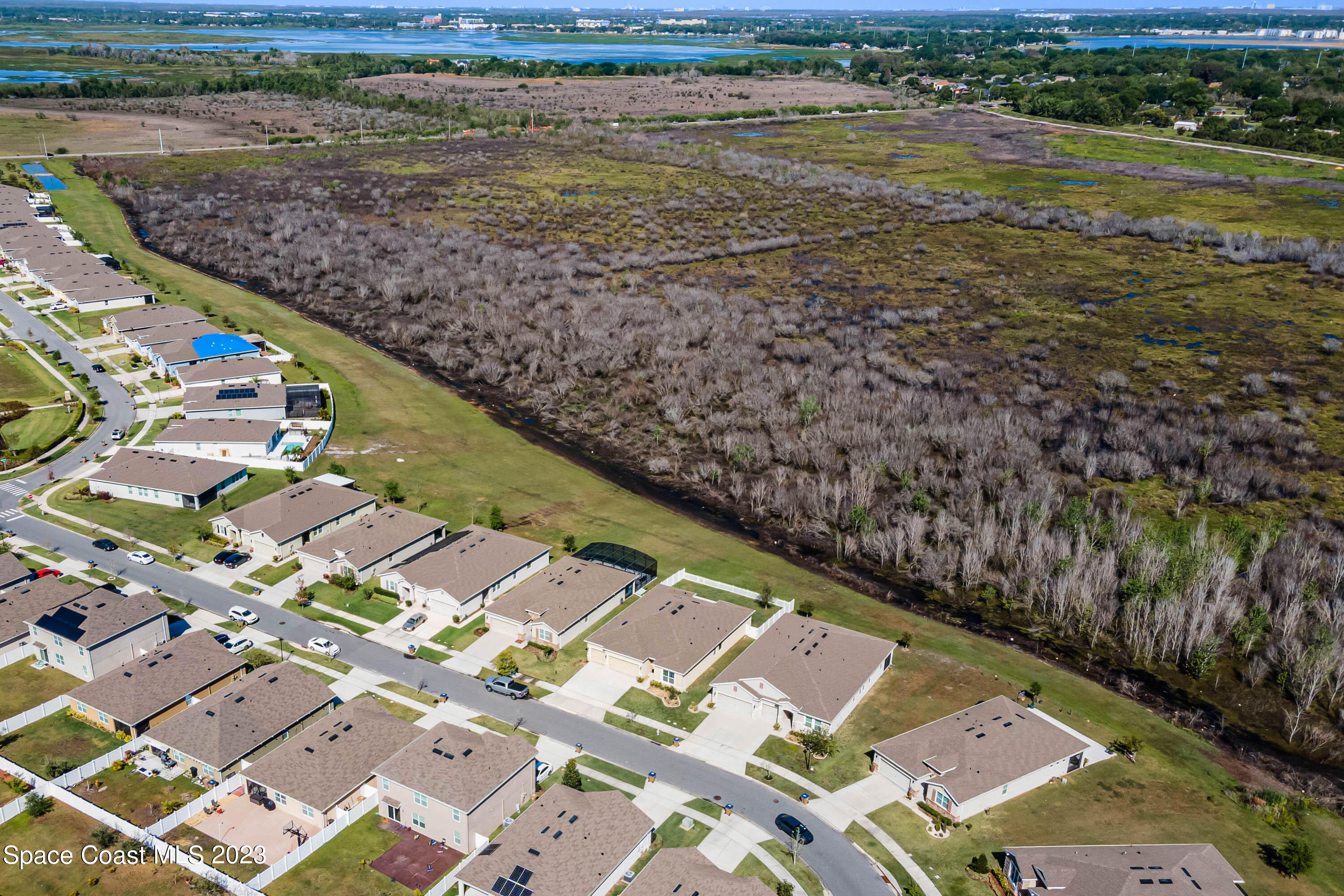 1803 Brockridge Road Kissimmee, FL 34744 - Photo 41 of 46 a view of a lake with a mountain