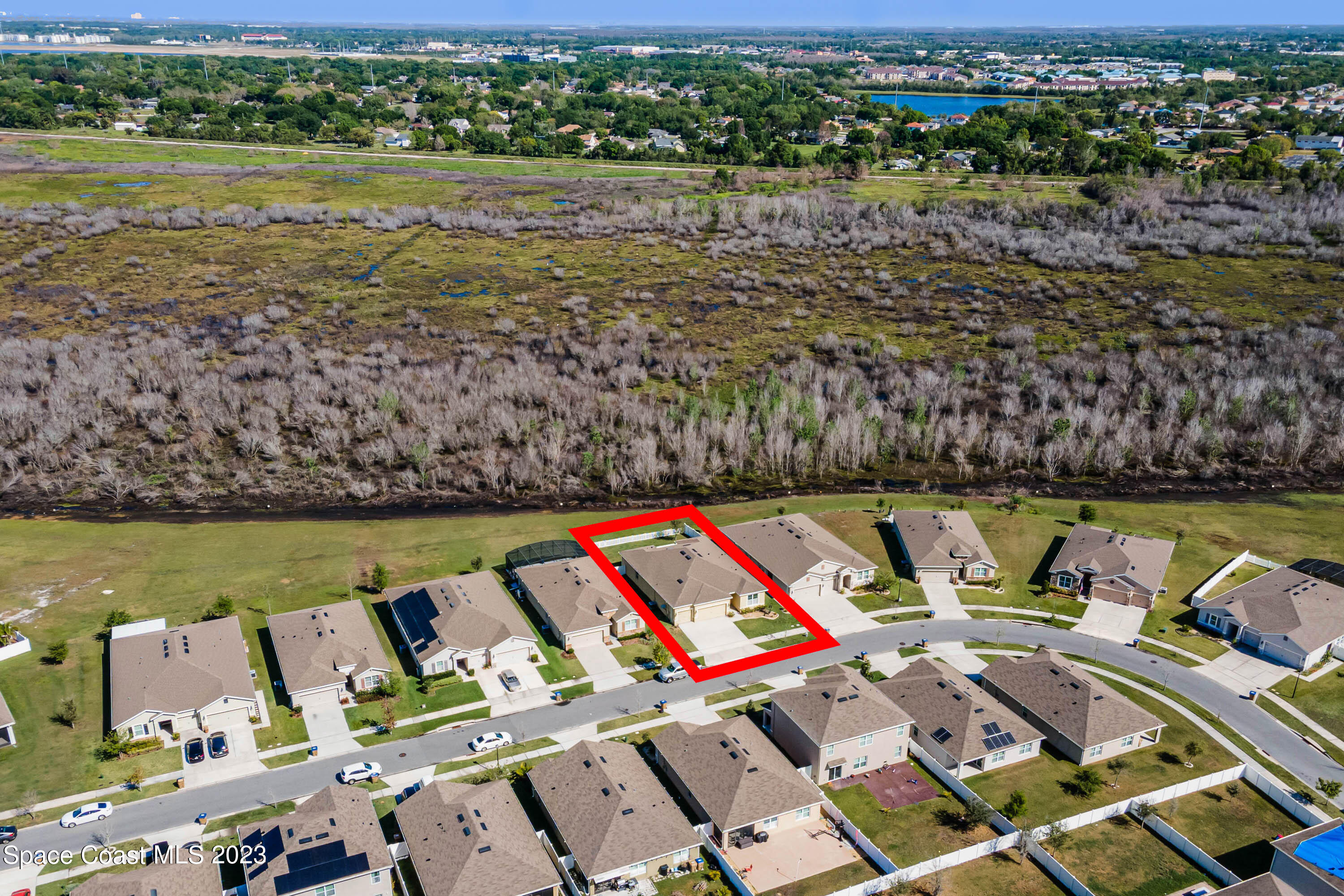 1803 Brockridge Road Kissimmee, FL 34744 - Photo 45 of 46 an aerial view of a house with a lake view