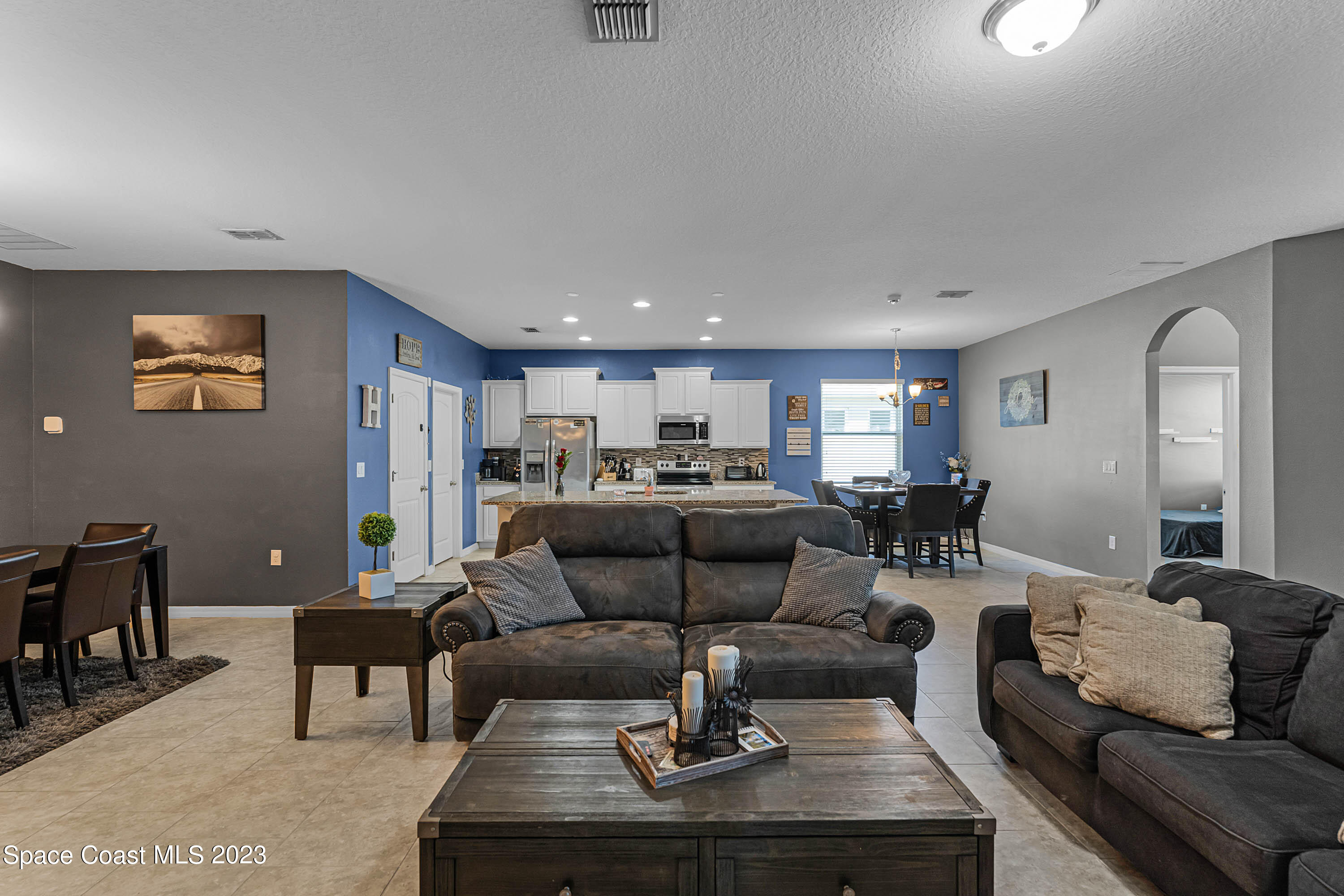 1803 Brockridge Road Kissimmee, FL 34744 - Photo 5 of 46 a living room with furniture and a couch